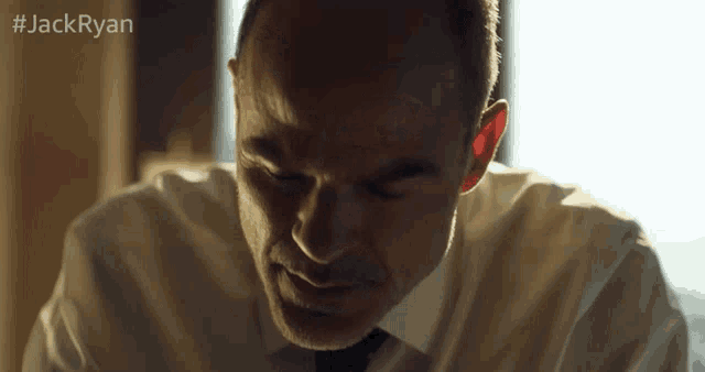 a close up of a man 's face with the hashtag #jackryan