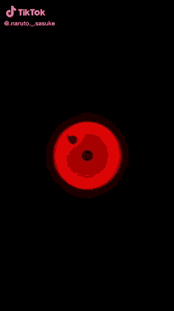 a glowing purple circle with a black background is a naruto symbol .