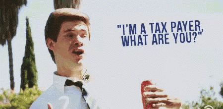 a man holding a can of dr pepper says " i 'm a tax payer "