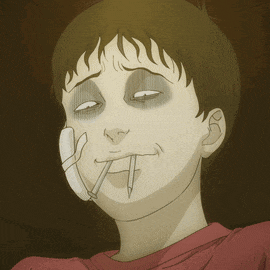 a boy with a phone in his mouth and a pencil in his mouth
