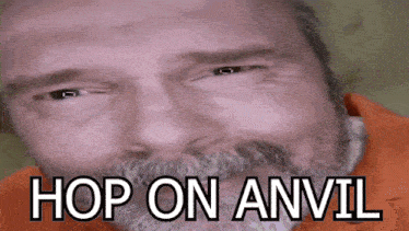 a close up of a man 's face with the words hop on anvil above it