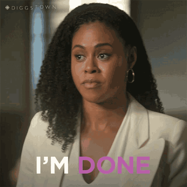 a woman with curly hair says i 'm done in pink