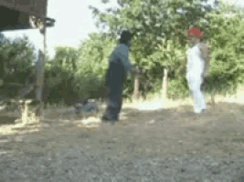 a blurry photo of two people standing in a field