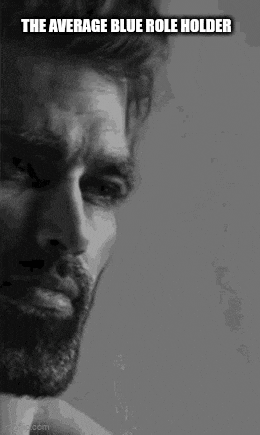 a black and white photo of a man with a beard and the words `` the average blue role holder '' .