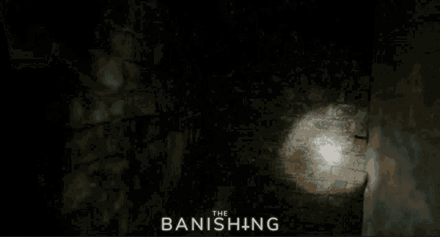 a gray background with the words the banishing in blue