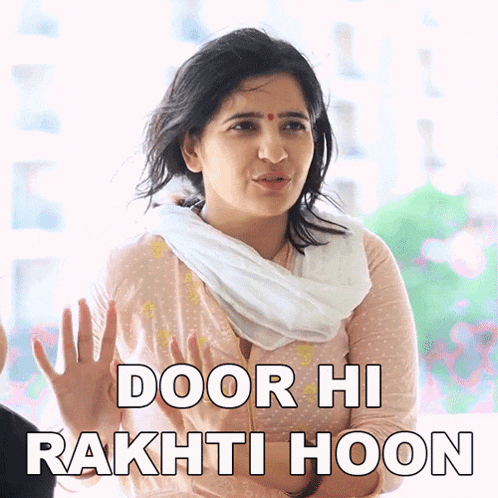 a woman says door hi rakti hoon with her hand up