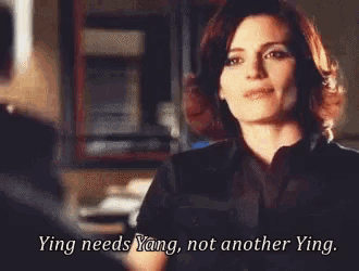 a woman is talking to a man and says " ying needs yang "