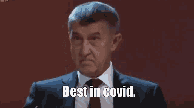 a close up of a man 's face with the words best in coooovid