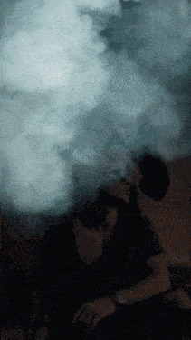 a man with smoke coming out of his head