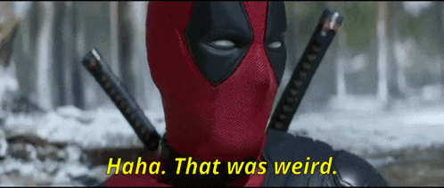 deadpool says " haha that was weird " while holding a sword