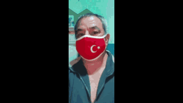 a man wearing a face mask with the words en güzel maskeler tc arif dalkilic
