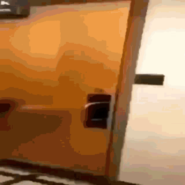 a close up of a door with a key on it