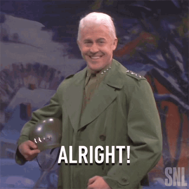 a man in a military uniform is holding a helmet and says " alright "