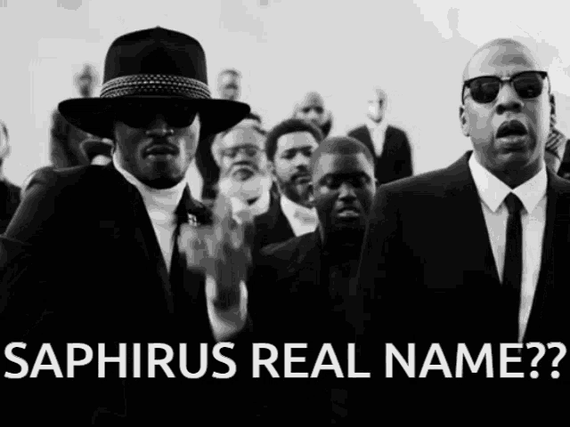 a black and white photo of men in suits and hats with the caption " saphirus real name "