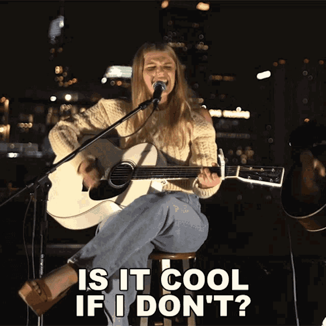 a woman singing into a microphone with the words is it cool if i don 't on the bottom