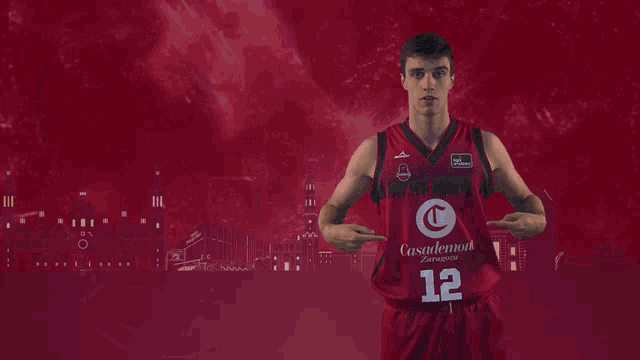 a basketball player named carlos alocen is wearing a red jersey