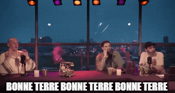 a group of people sitting at a table with the words bonne terre bene terre bene terre