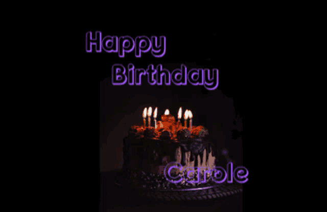 a birthday cake with lit candles and the words happy birthday