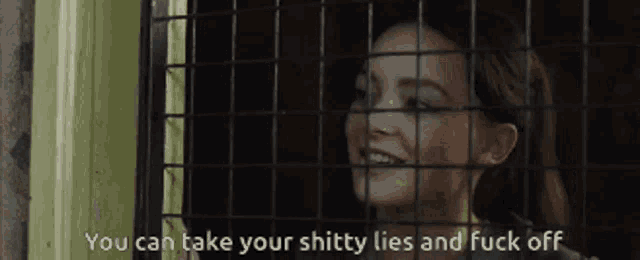 a woman behind bars with the words " you can take your shitty lies and fuck off " written below her