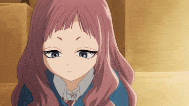 a girl with pink hair and blue eyes has a serious look on her face