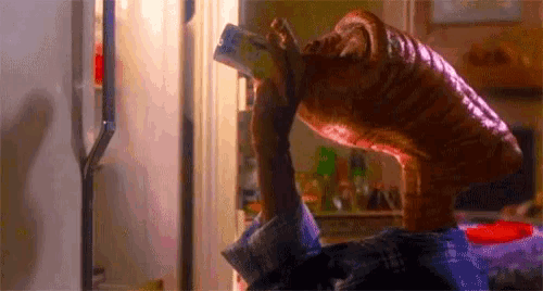 a monster with a long neck is eating a person 's arm .