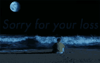 a man sits on the beach at night with the words sorry for your loss