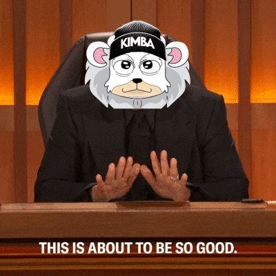 a man in a suit and tie is sitting at a desk with a cartoon bear mask on his head .