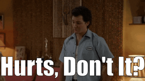 a man in a blue shirt says " hurts don 't it ? "