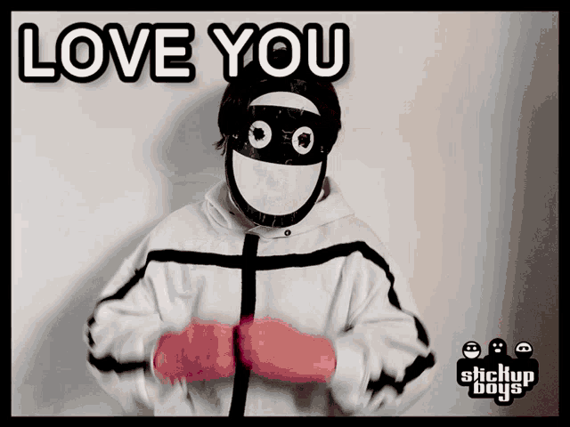 a person wearing a mask with the words love you written on it