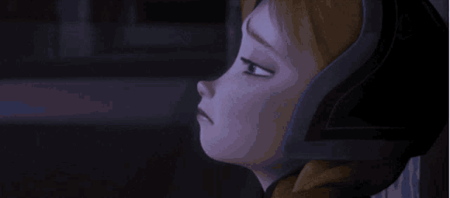 a close up of a woman 's face with her eyes closed .