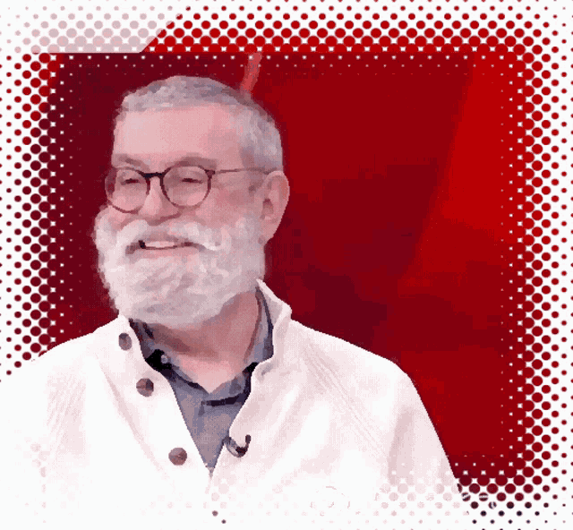 a man with a white beard and glasses is smiling