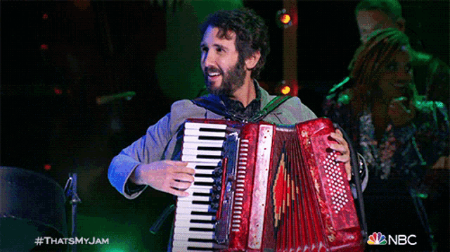 a man is playing an accordion on nbc 's that 's my jam show