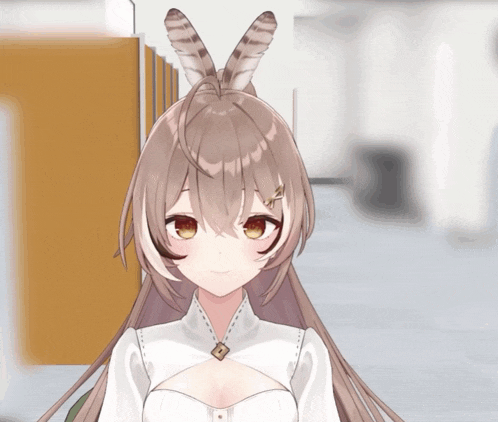 a girl with long brown hair and feathered ears is wearing a white top
