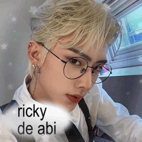 a picture of a man with glasses and the name ricky de abi on the bottom