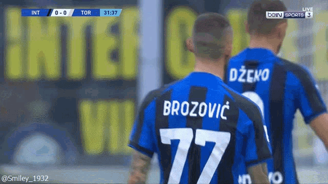 a soccer player with the number 77 on their back