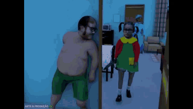 a man in green shorts is kicking another man in a room with arte & producao on the bottom right