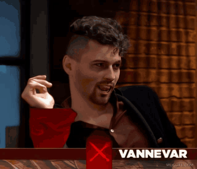 a man sitting at a table with the name vannevar written on the bottom