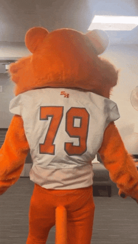 a mascot wearing a jersey with the number 79 on the back
