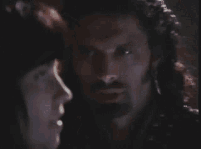a man and a woman are looking at each other with the words you are absolutely breathtaking below them