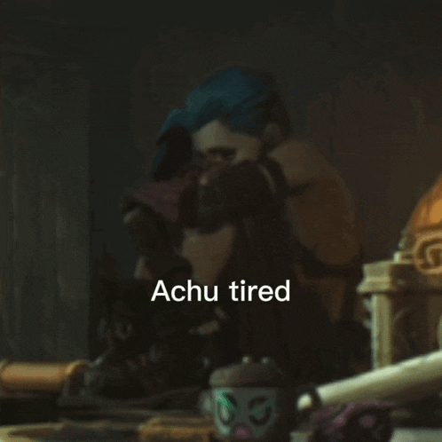 a cartoon character is sitting at a table with the words achu tired written on the bottom