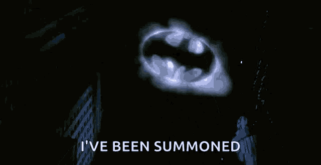 the batman logo is glowing in the dark and says `` i 've been summoned ''