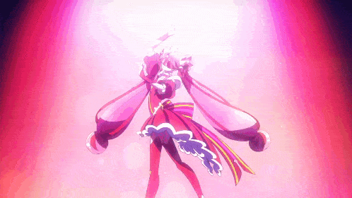 a woman in a pink dress is standing in front of a purple light