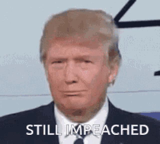 donald trump is wearing a suit and tie and making a face .