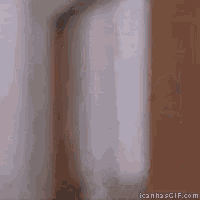 a blurry picture of a person wrapped in a white towel