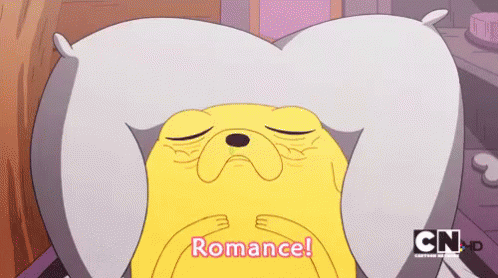 The Romance Is Alive GIF - Adventure Time Jake Romance GIFs