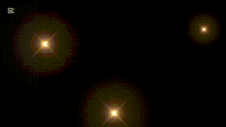 a bunch of lights are shining in the dark