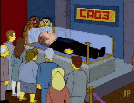 a cartoon of a man laying in a coffin with a sign that says cage on it