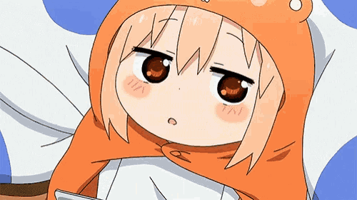 a cartoon girl is laying on a bed wearing an orange hooded sweater .