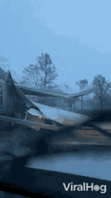 a video of a house that has been destroyed by a tornado is being shared on viralhog