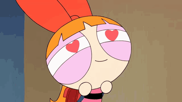 a close up of a cartoon character with a heart in her eyes